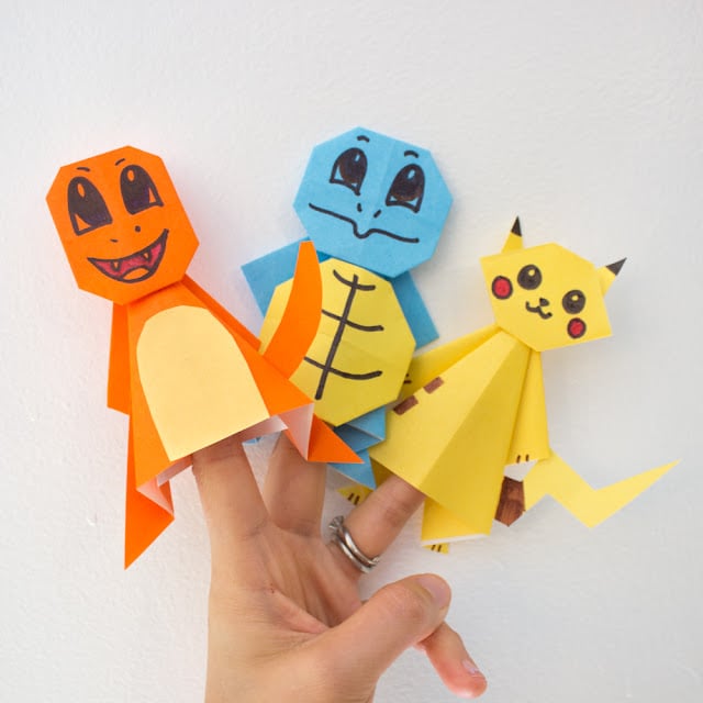 pokemon finger puppets pokemon origami pikachu, squirtle and charmander on hand