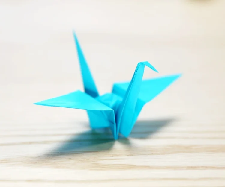 blue origami paper crane 