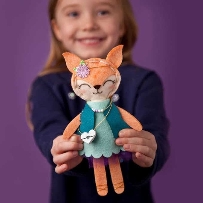girl holding diy fox plushie doll