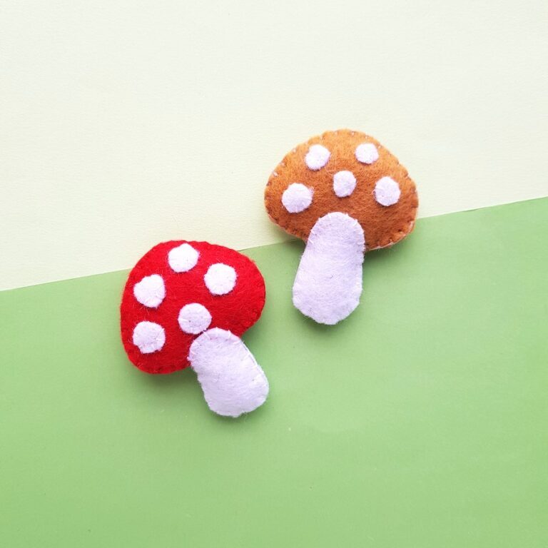 felt mushroom plushies in orange and red