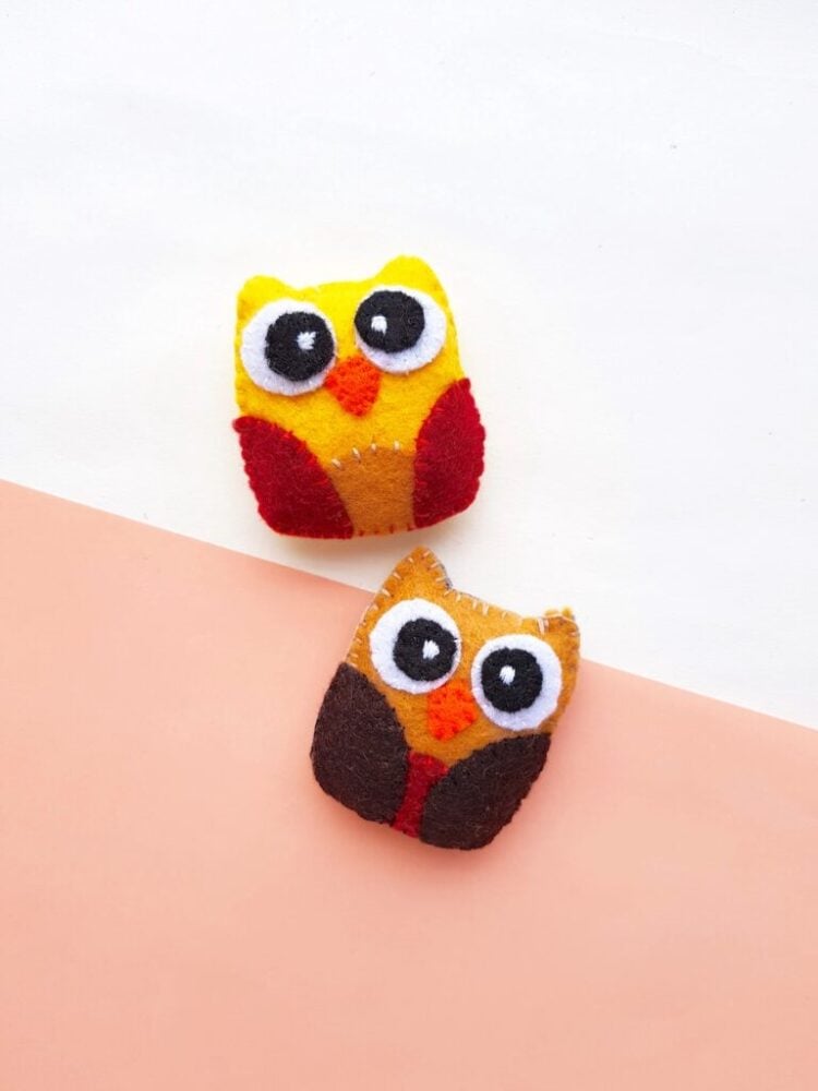 two big eyed felt plushie owls