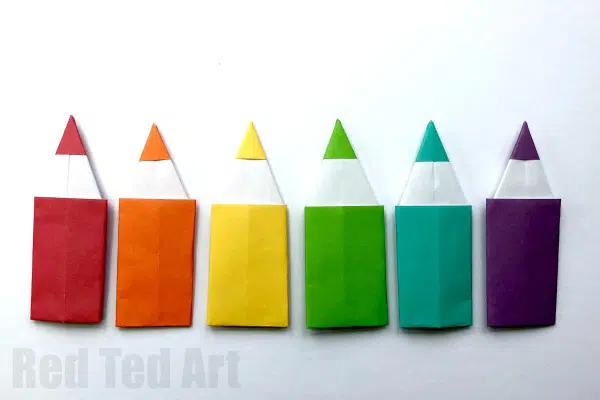 colorful origami made pencils in a row