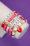 Valentines Bracelet Set with Clay Heishi Beads on purple background