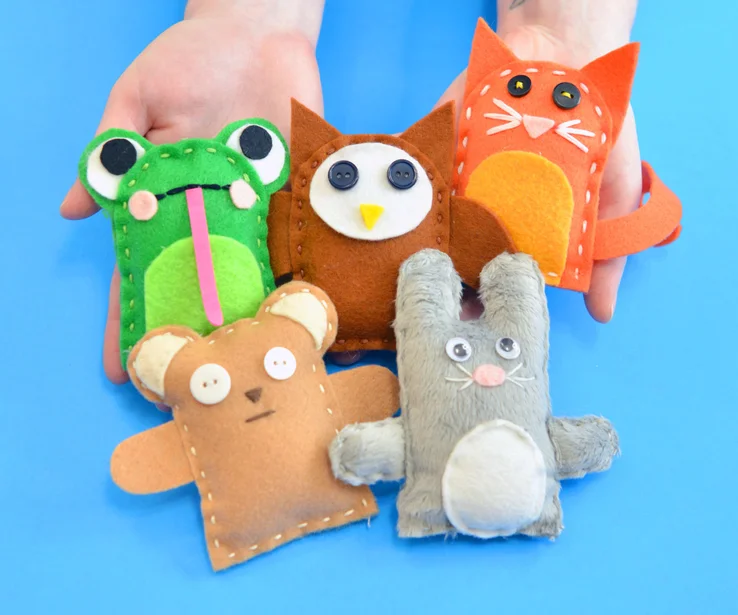 cute silly felt plushies in hands
