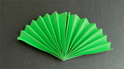simple origami fan in green