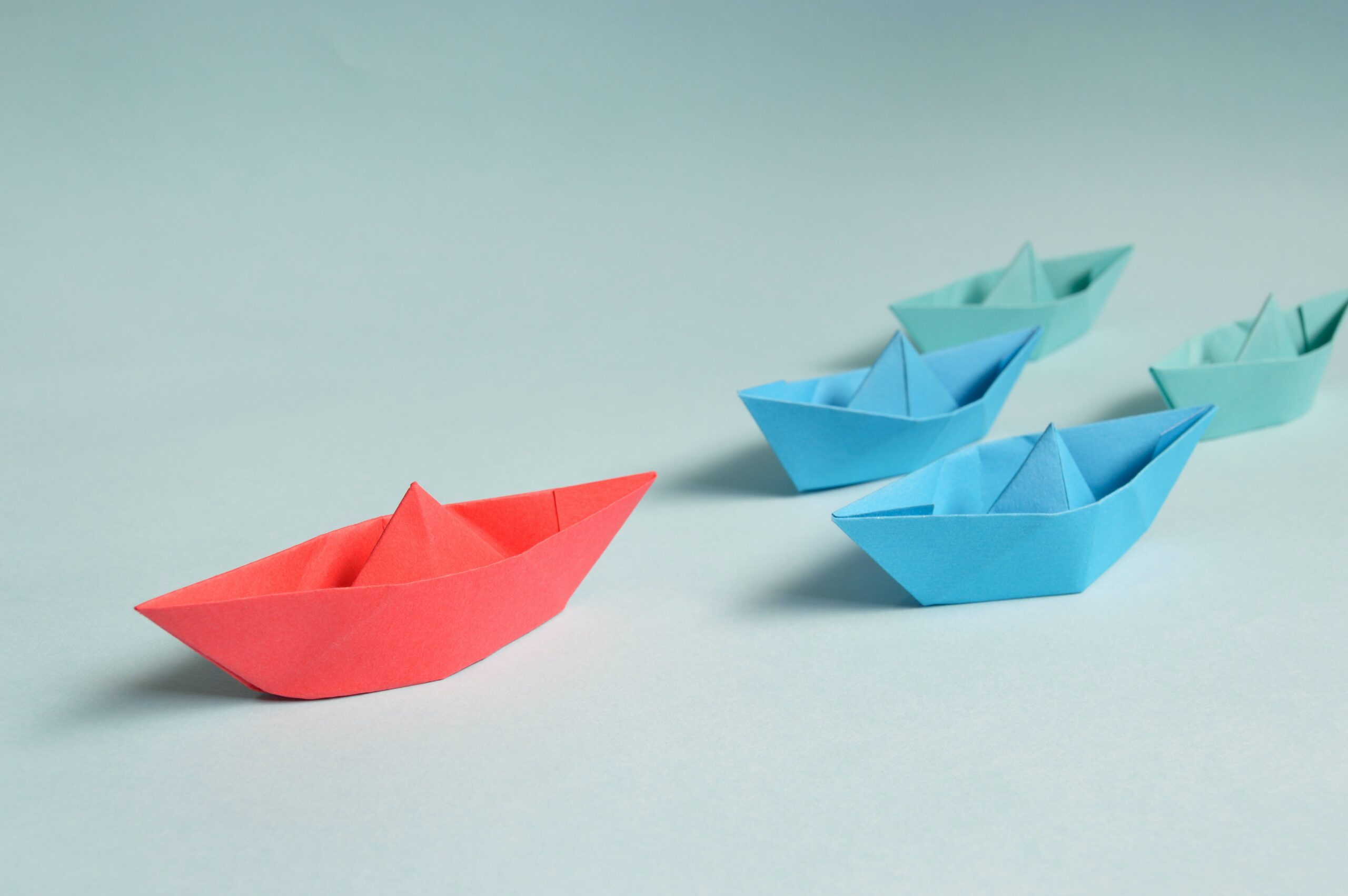 origami boats in different colors