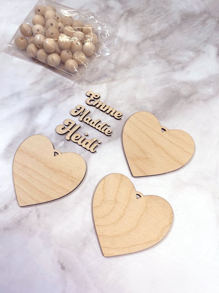 Wood supplies to make heart cookie ornaments