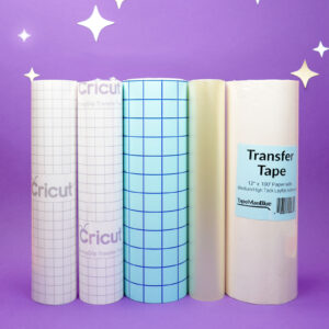 Five rolls of transfer tape on a purple background