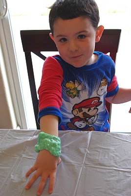 homemade slime on childs wrist 