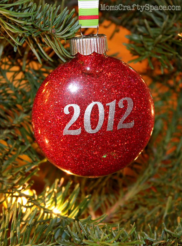 back of ornament reads year 2012 in glitter 