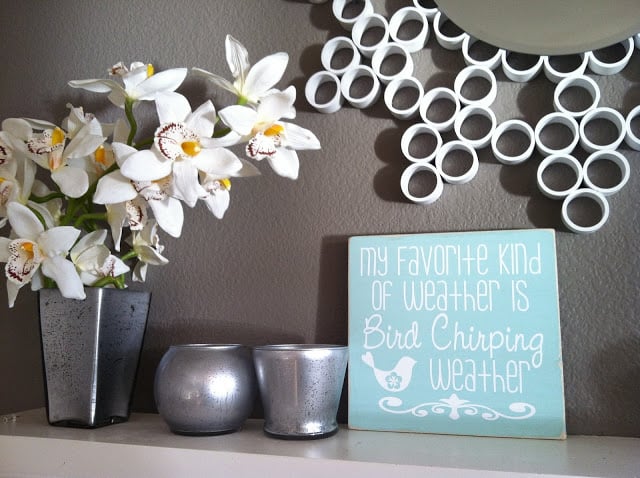 vases and sign on mantel