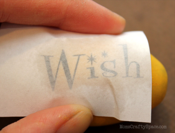 peeling sticker that reads \"wish\" 