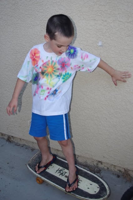 kid wearing tie dye shirt with sharpie tie dye 
