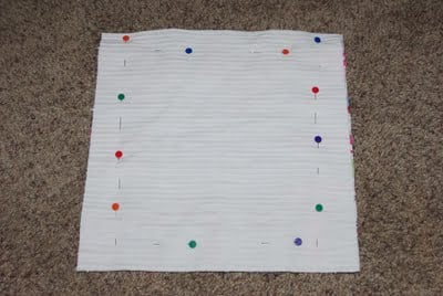 layer pinned to baby blanket