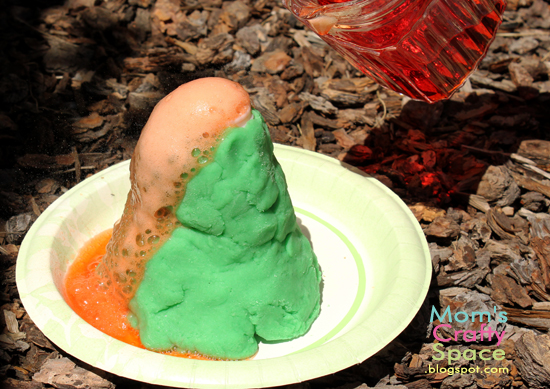 chemical reaction making volcano spew 