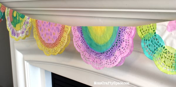 easter watercolor doilies hung on banner 
