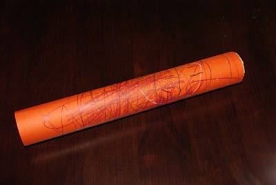 kid drawn on rainstick 