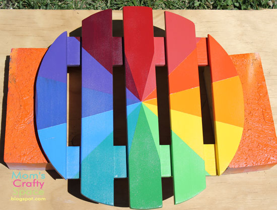 rainbow colored outdoor clock
