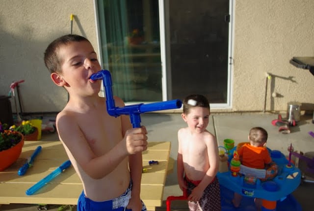 kid enjoying outdoor playtime with homemade marshmallow guns