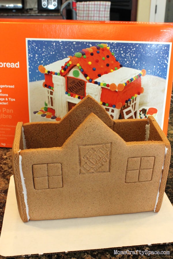 assembling walls of gingerbread house first 