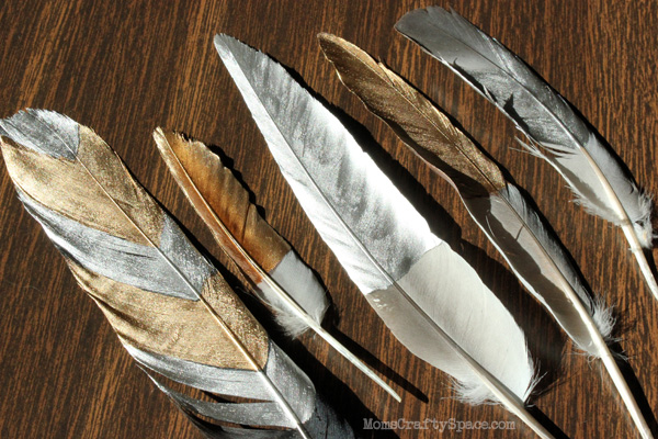 feathers gilded in various patterns and colors
