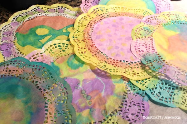 watercolor doilies painted in various shades for easter 