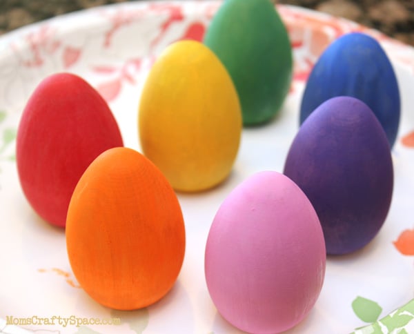 painted easter eggs drying on paper plate