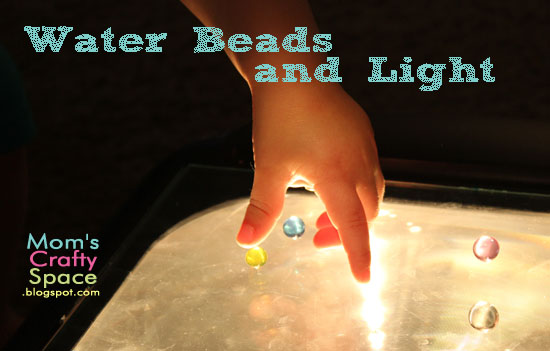 water beads and light child sensory activity