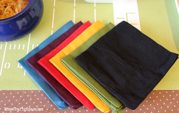 folded cocktail napkins in various colors