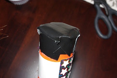 black tape covering bottom of rain stick 