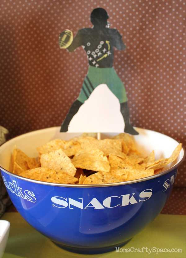 snack bowl with football decoration full of chips 