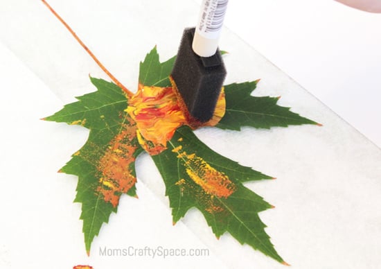 painting real leaves with fall splatter paint 
