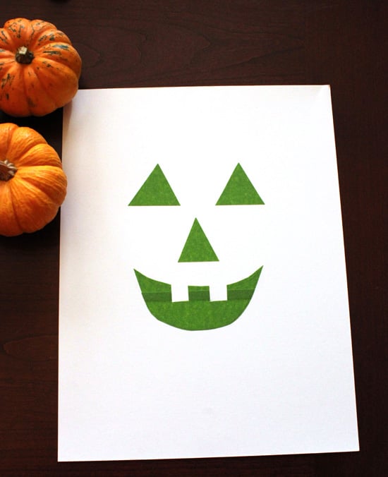 jack o lantern face painted on paper