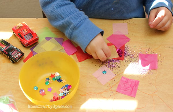 children playing with shapes and glitter