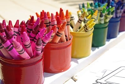 crayons and matching tin cans for assorting 