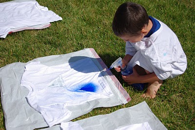 shirts being painted by kid