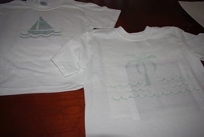 designs stenciled on white shirts