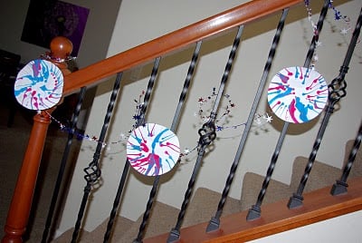 salad spinner fireworks hung up on stairs 