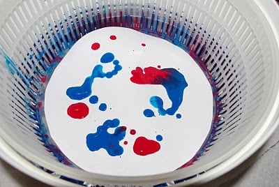paint on plate inside of salad spinner