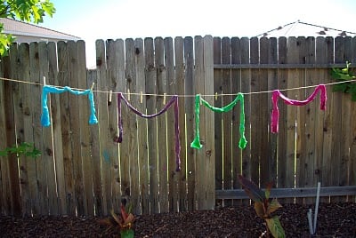 dyed wool hanging outside to dry