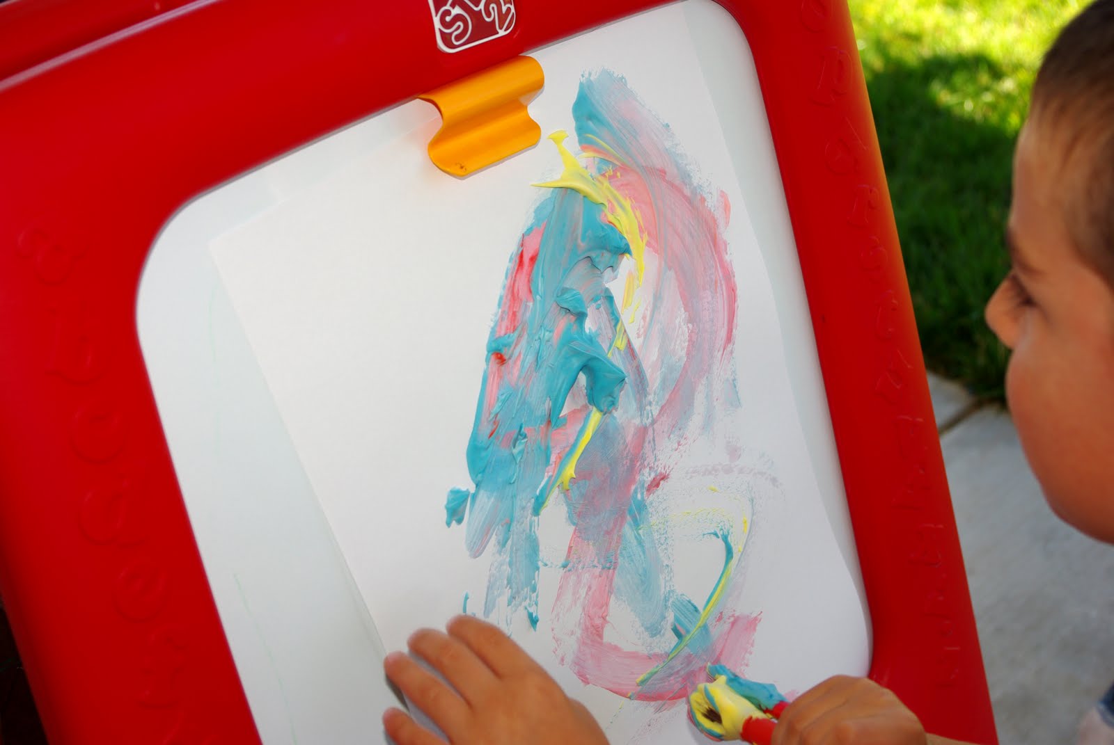 shaving cream paint picture on easel 