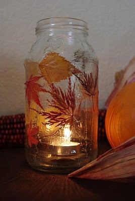 candle lit inside of pretty fall lantern