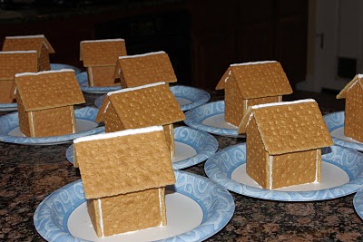 many gingerbread houses ready to be decorated