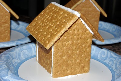 ginger bread house undecorated on plate